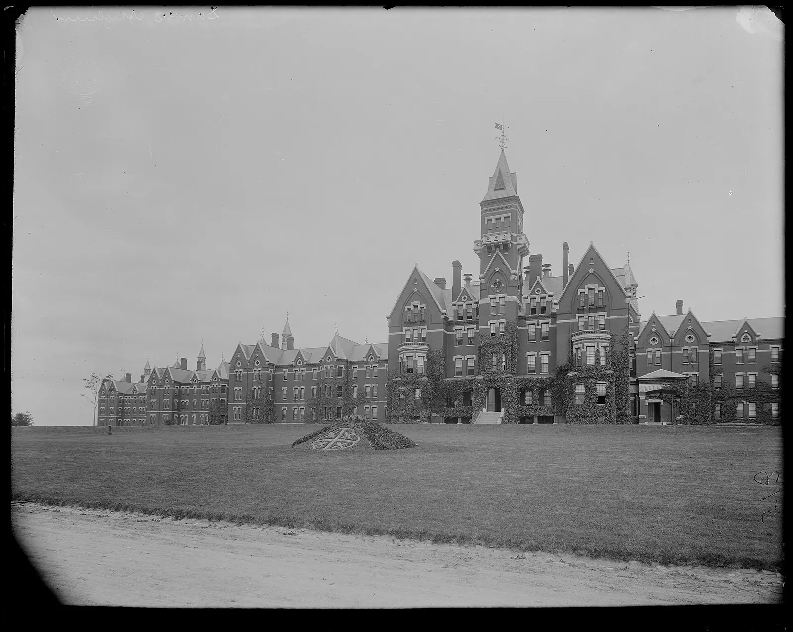 Danvers State Hospital: Danvers, Newbury Street, Danvers Insane Asylum, exterior, by Frank Cousins, c. 1865-1914, from the Digital Commonwealth - commonwealth 2b88r6648