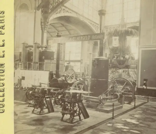De Machinehal op de Wereldtentoonstelling van 1878, met machines van de Gebr. Stork & Co uit Hengelo Galerie des Machines Exposition Universelle 1878 (serietite