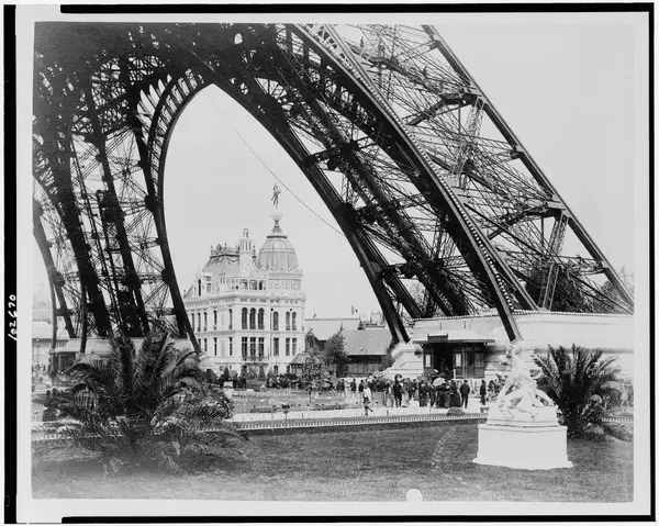 Gas Pavilion viewed through the base of the Eiffel Tower, Paris Exposition, 1889