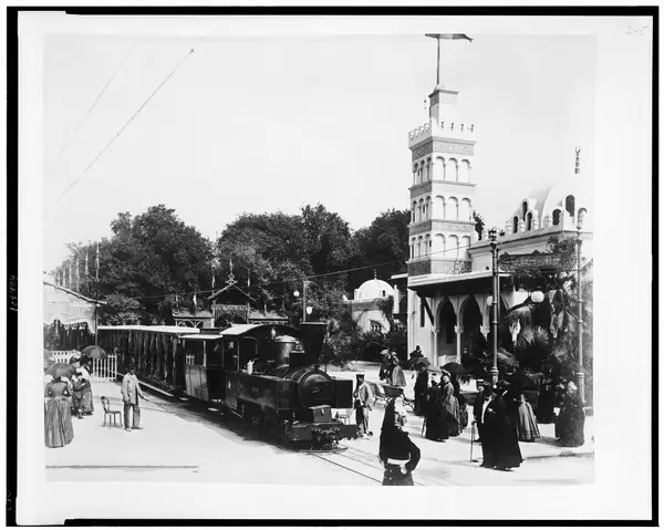 Passenger train in front of the Pavilion of Algeria on the Esplanade des Invalides, 1889