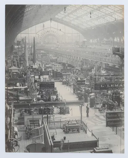 General view of the Galerie des Machines with a policeman in the aisle