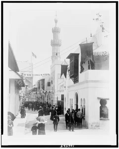 People on "a street in Cairo" in front of Moroccan café, Paris Exposition, 1889