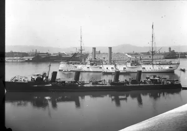 The USS Chicago (1885) (back) and USS Perry (DD-11) (front) at the Lewis and Clark Centennial Exposition in June, 1905. Description/Notes: Photo shows a scene f