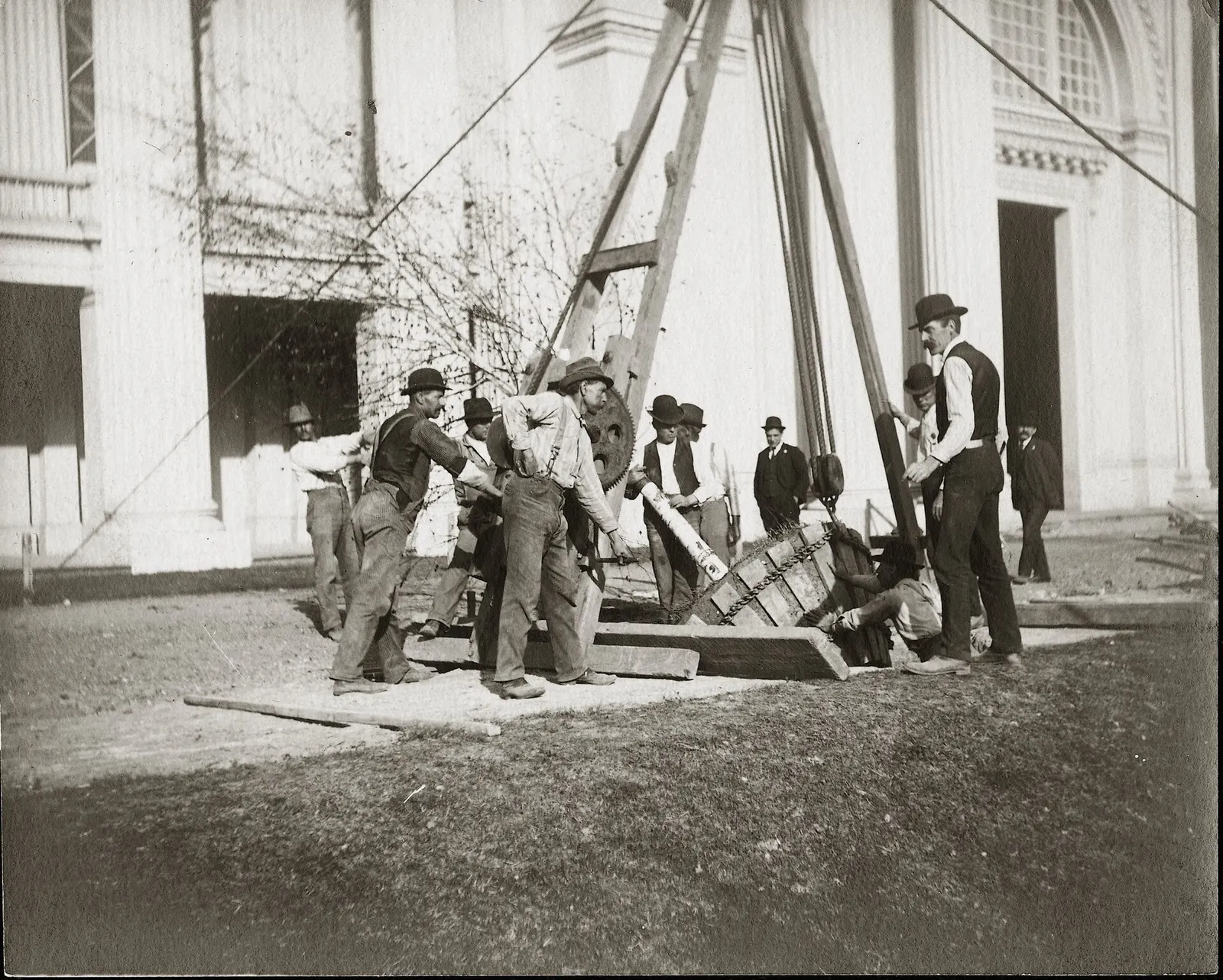 Louisiana Purchase Exposition: Workers planting a tree in front of the Palace of Electricity in preparation for the Louisiana Purchase Exposition