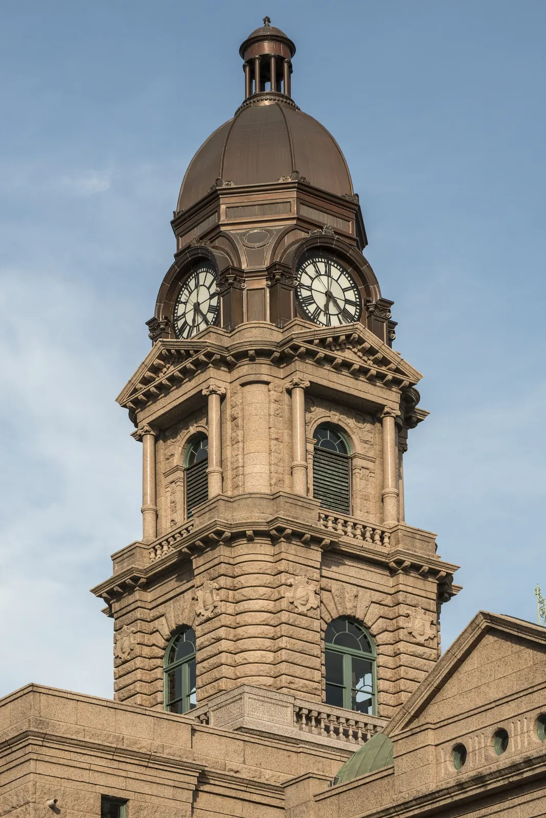 Tarrant County Courthouse: Clock tower of the Tarrant County Courthouse and adjacent buildings in Fort Worth, Texas LCCN2014633396