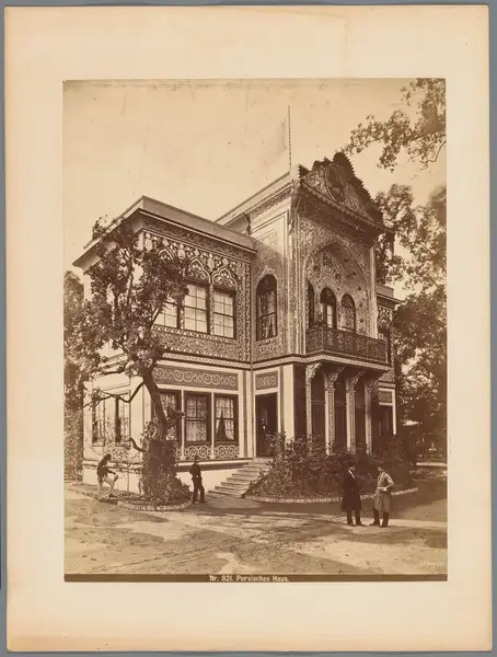 Men posing in front of the Persian House, 1873